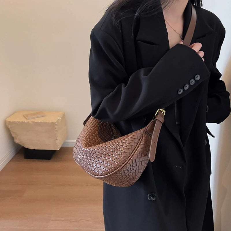 Woven half-moon bag