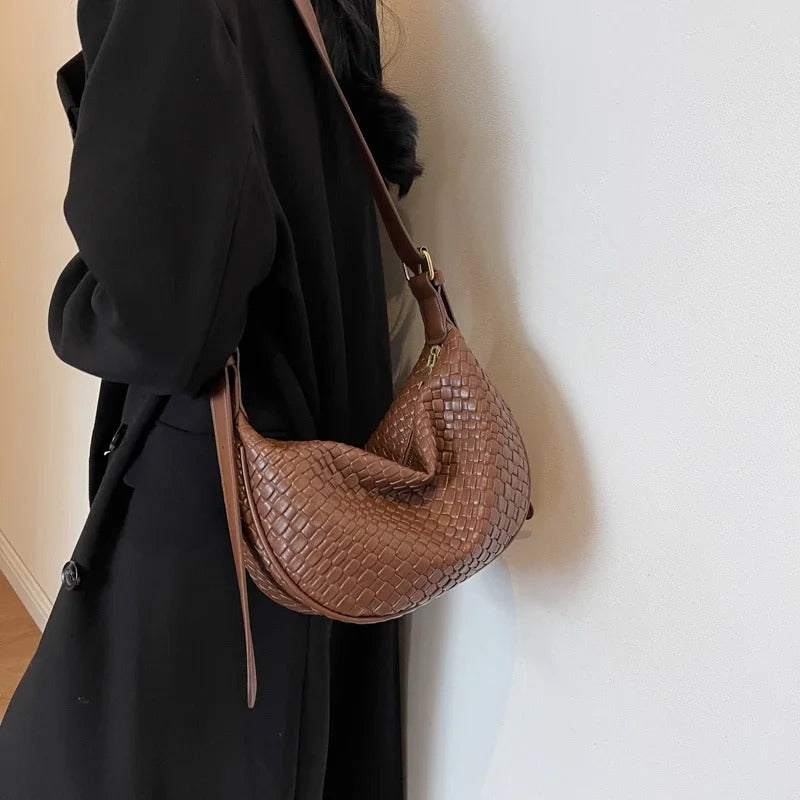 Woven half-moon bag