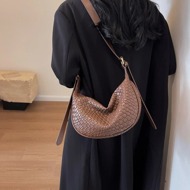 Woven half-moon bag