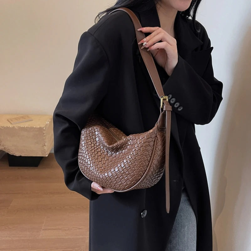 Woven half-moon bag