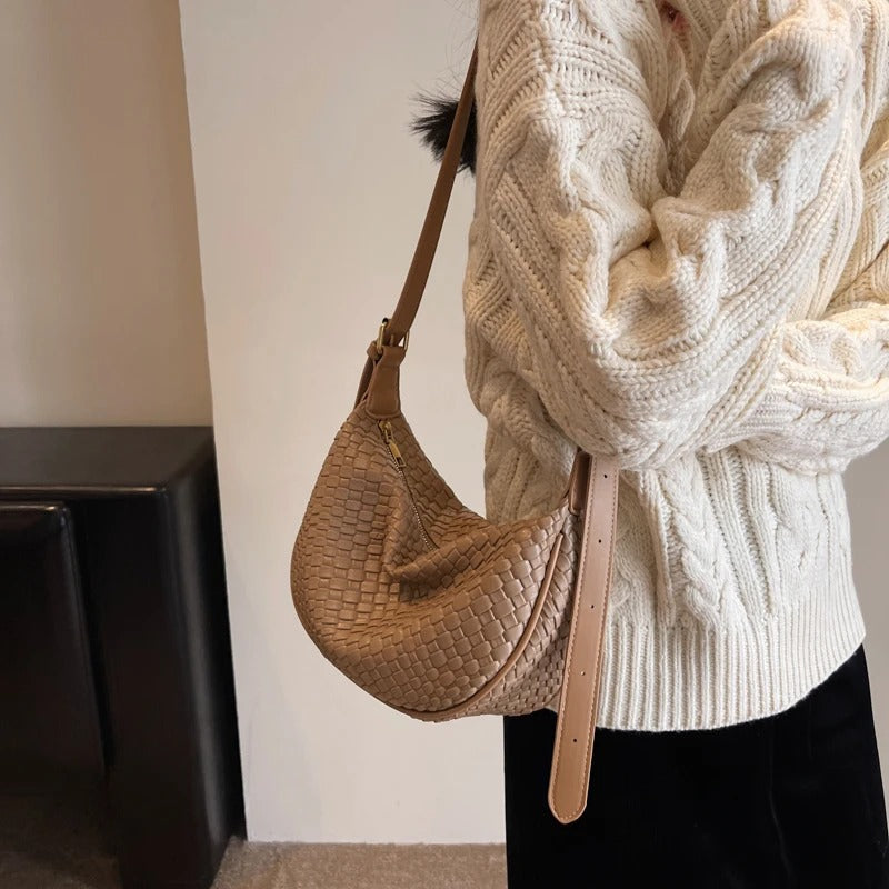 Woven half-moon bag