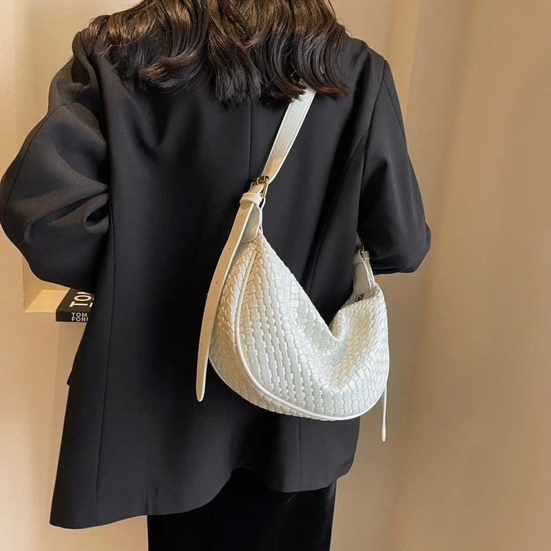 Woven half-moon bag