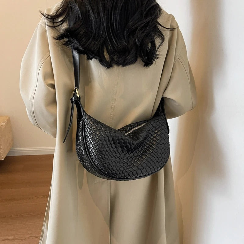 Woven half-moon bag