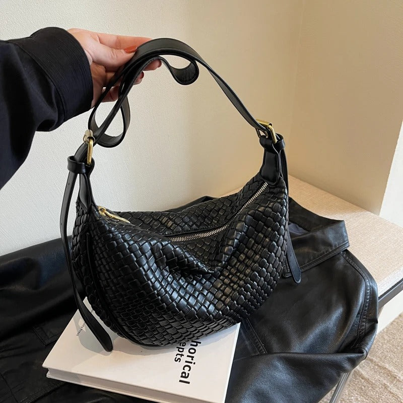 Woven half-moon bag