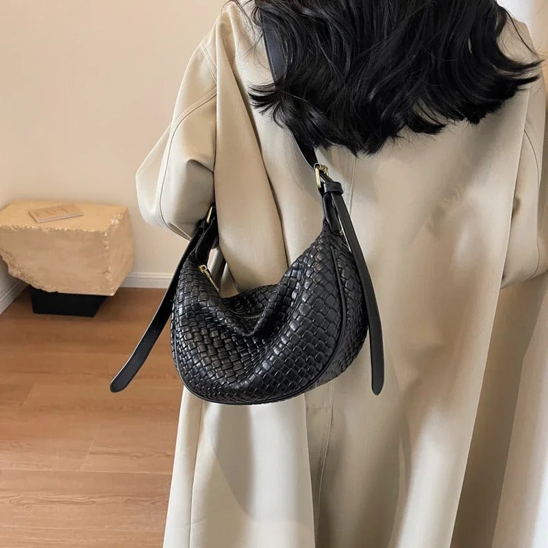 Woven half-moon bag