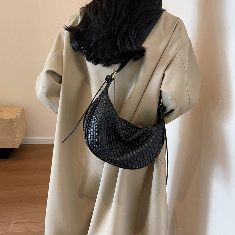 Woven half-moon bag