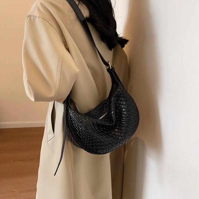 Woven half-moon bag